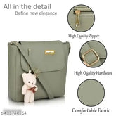 PU crossbody bag for girls, solid net pattern, 2 compartments, adjustable strip, top zip closure, wide bottom base, gold metal logo